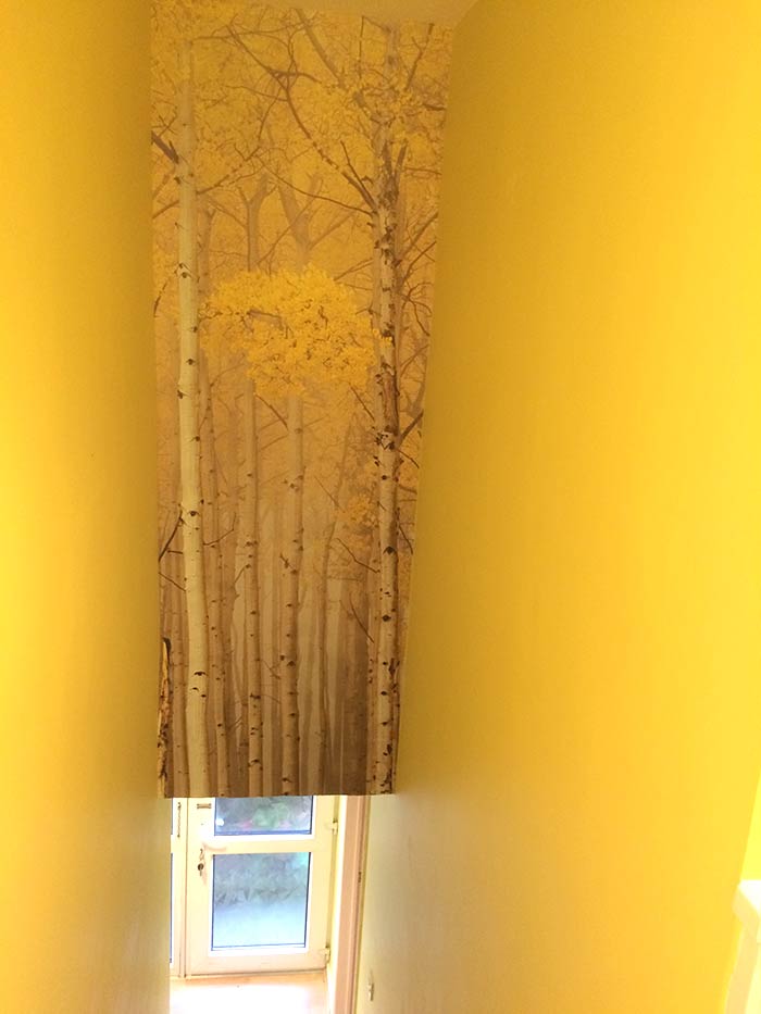 Stairs painting and vertical wallpaper